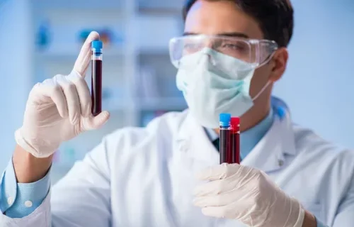 depositphotos 199142586 stock photo lab assistant testing blood samples